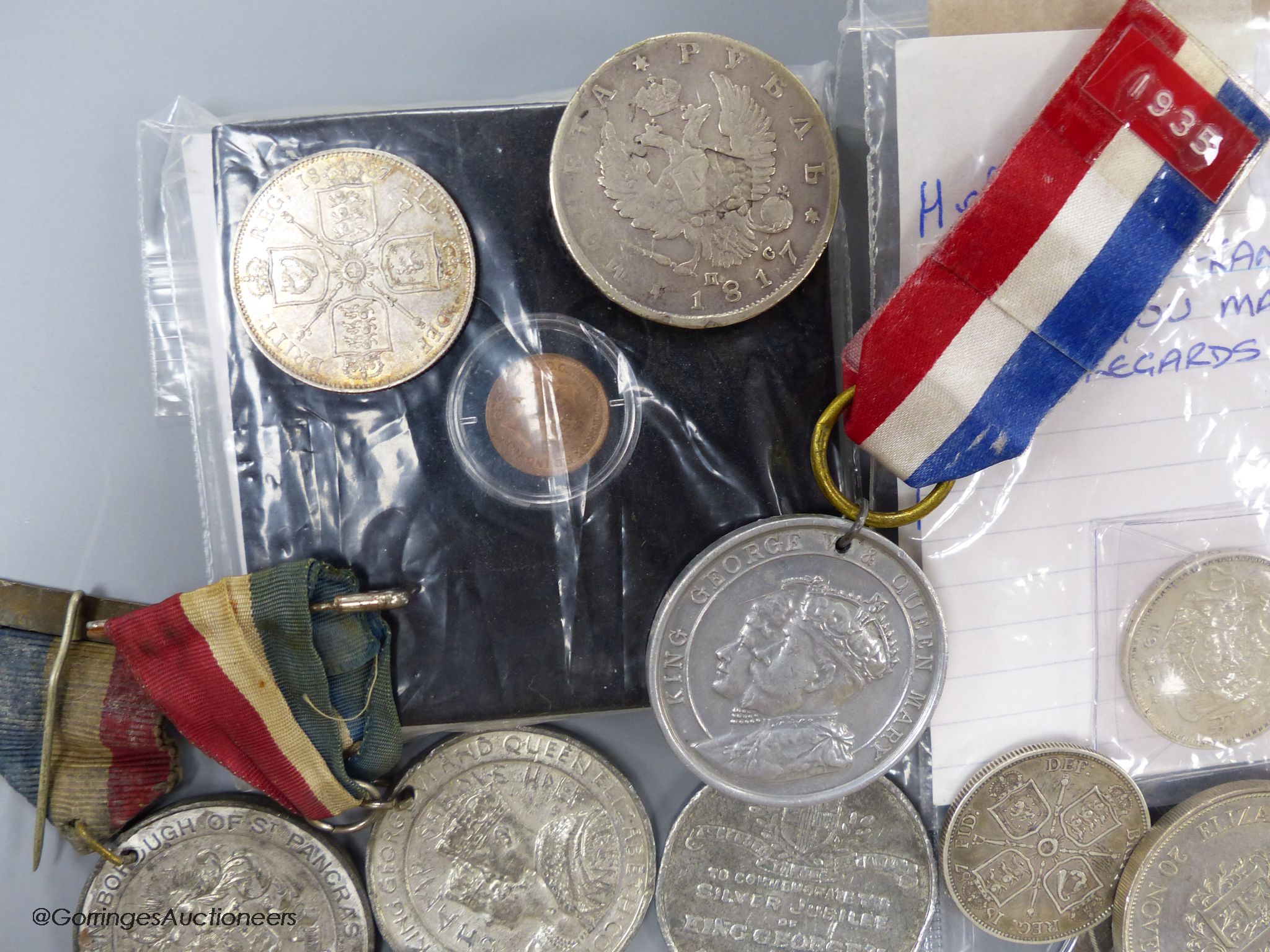 A group of assorted coins and medals